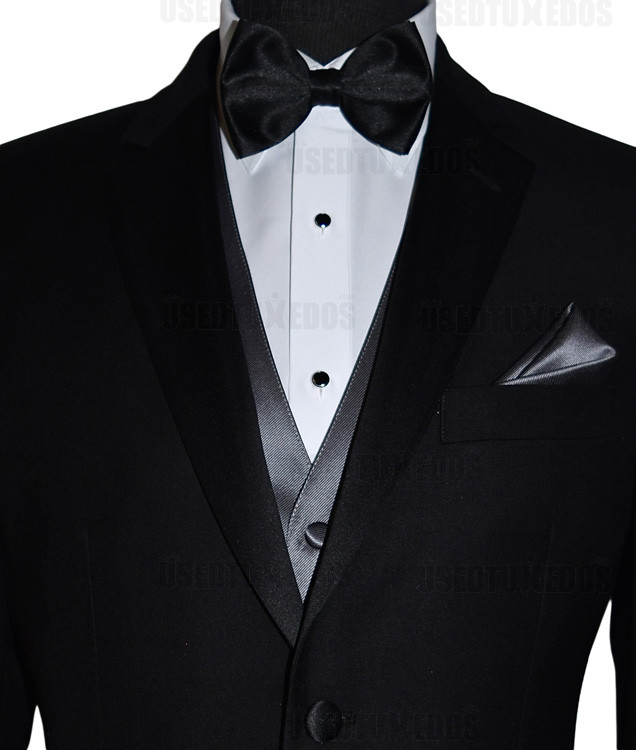 black pre-tied bowtie with charcoal vest and black studs and cufflinks by San Miguel Formals